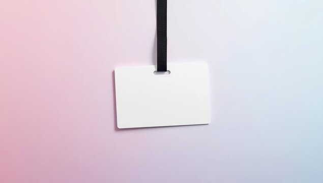 Blank white ID badge mockup with a black strap on a pink-blue backdrop. Staff name tag. Area for text and design. Overhead view. Flat layout.