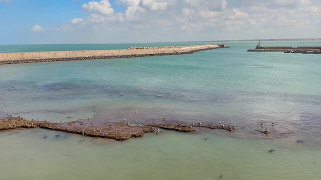 View of El Jadida Harbor Through Stone Wall Hole, Morocco