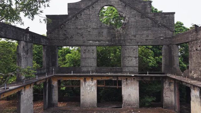 Aerial Drone Tilt Over Barracks Ruin Reveal Jungle Horizon Phillipines View Corregidor Island Manila