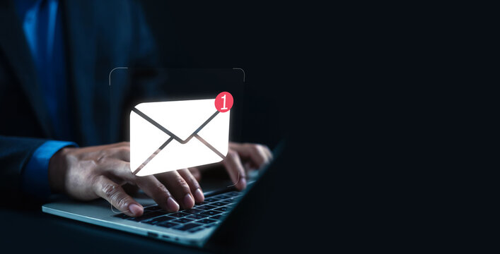 Business professional receiving new email notification on laptop. Digital communication, inbox management, online messaging, customer support, marketing campaign and workflow concept.