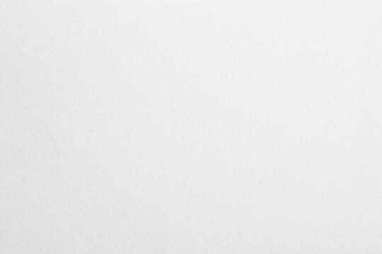White recycled craft paper texture as background. Grey paper texture, Old vintage page or grunge vignette of old newspaper. Pattern fabric rough art creased grunge letter with copy space for text.