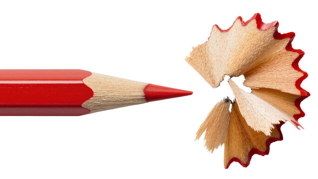 Red colored pencil with sharp point and wood shavings