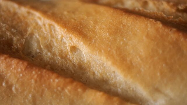 50p macro slider shot moving across rustic bread crust in side view