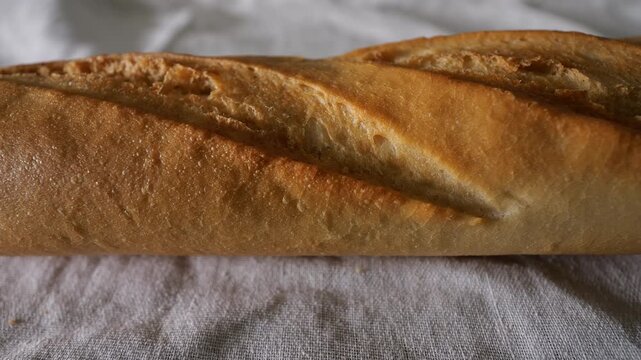 50p overhead slider shot moving across the texture of rustic bread