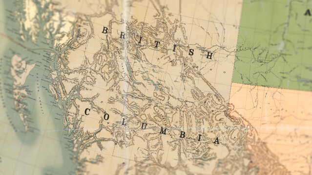 Macro View of Vintage Map Highlighting British Columbia Canada with Detailed Geographic Cartography