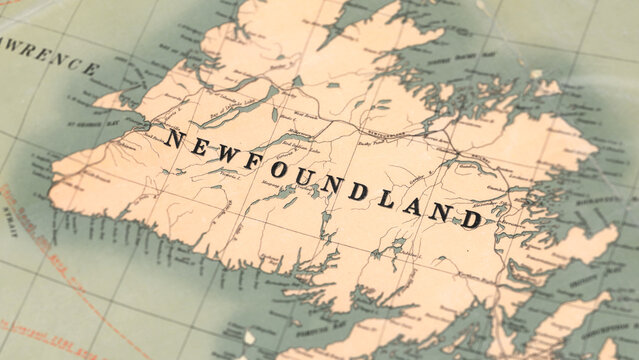 Macro View of Vintage Map Highlighting Newfoundland Canada with Detailed Geographic Cartography