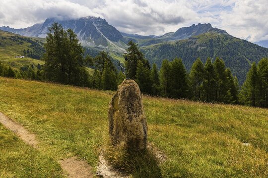 Planetary path, here the motif stone for the planet Mercury, above Saint Luc, Val d'Anniviers, Valais Alps, Canton Valais, Switzerland