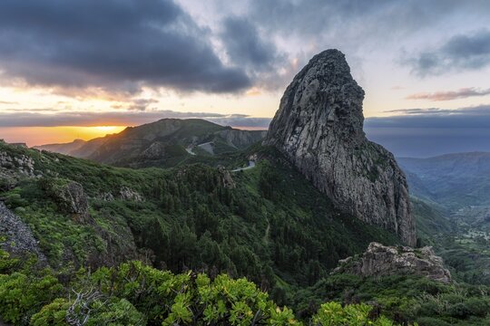 View of the Roque de Agando rock tower, one of La Gomera's landmarks, from the Mirador Roque de Agando. Sunrise, good weather. Monumento Natural de Los Roques, La Gomera, Canary Islands, Spain