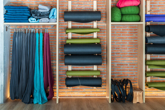 Exercise equipment arranged in rack at yoga studio