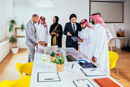 Diverse international business team having a meeting in Riyadh office