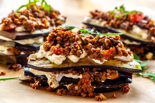 Aubergine lasagne on baking paper, vegetarian