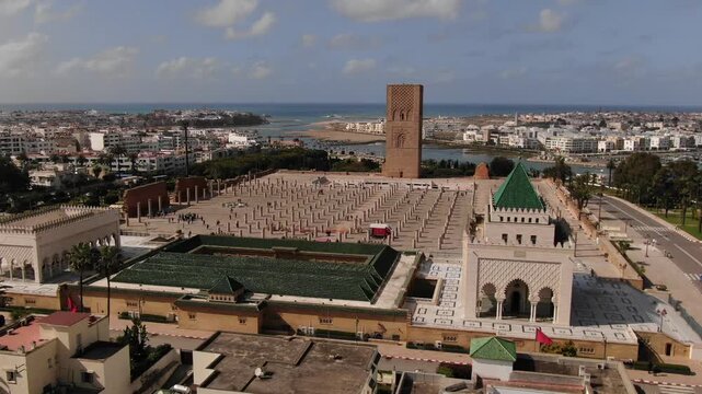 Drone aerial view of Hassan Tower and the Mausoleum of V in Rabat, the capital of Morocco. This iconic historic landmark complex reflects the nation&rsquo;s rich heritage, Islamic architecture, and