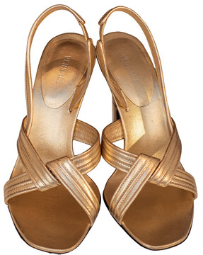 Gianni Metallic Nappa sandals in gold-laminated leather with an interwoven band pattern by Versace.Milan - Italy,08 June 2026