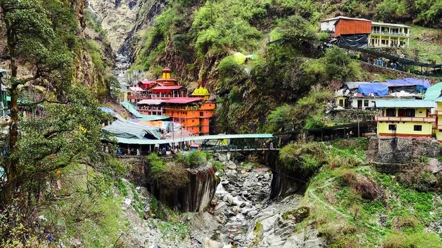 Yamunotri temple surrounded by beautiful snow clapped mountains of Himalaya in Utara Khand