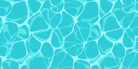 Obraz premium A close-up view of shimmering turquoise water surface with ripples and reflections.