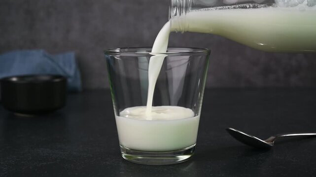 Serving buttermilk in a glass cup.