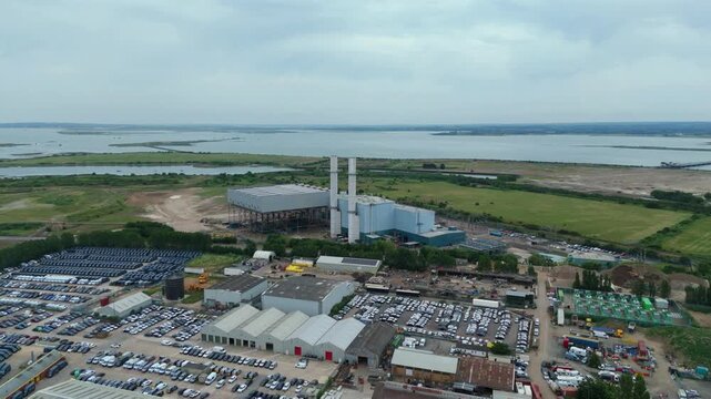 Aerial View of a Massive Coastal Industrial Estate and Modern Utility Grid Complex in Kent Countryside