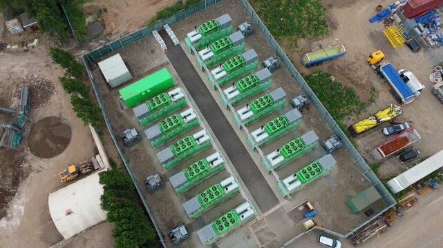 Top down aerial view of battery energy storage system BESS array near a power station in Kent, UK