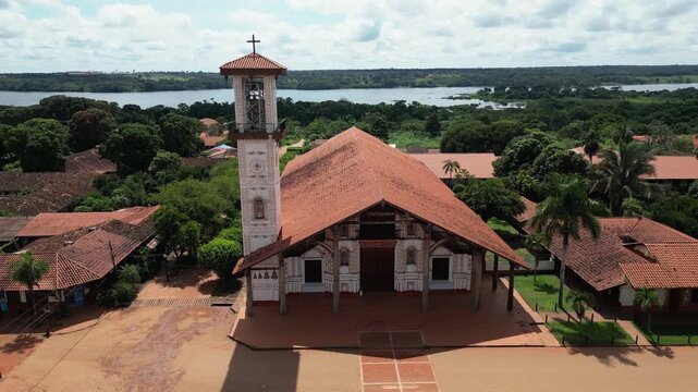 Aerial view as moto drives past cathedral in San Ignacio de Velasco BOL