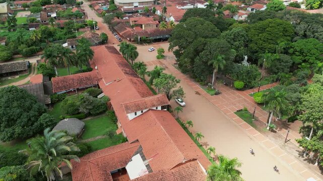 Light traffic drives by central plaza in San Ignacio de Velasco Bolivia