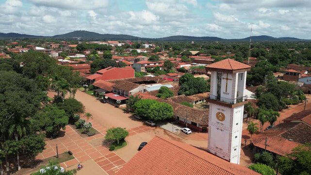 Aerial pulls out from bell tower of San Ignacio Cathedral in Bolivia