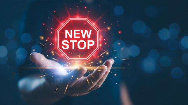 Glowing stop sign, new beginning concept, hand holding neon light, business innovation, technology symbol