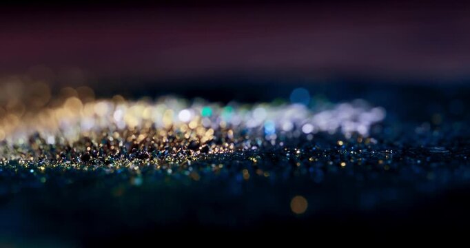 Experience vibrant metal particles reacting to magnetism on a deep black background, creating dynamic footage ideal for engaging motion graphics and abstract visual effects for creative projects