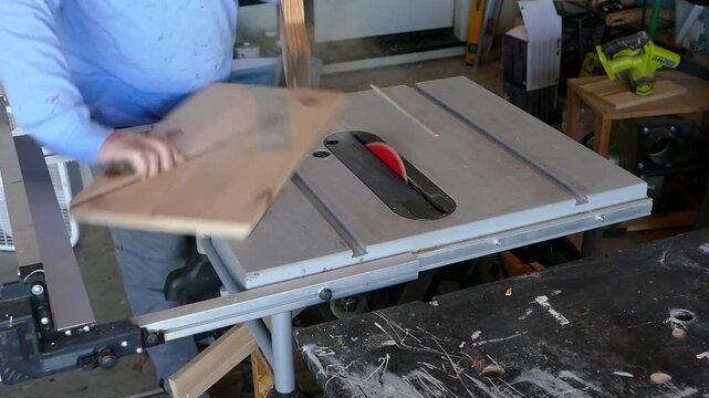kickback while cutting on a jobsite table saw, highlighting the dangers of improper setup and saw safety.