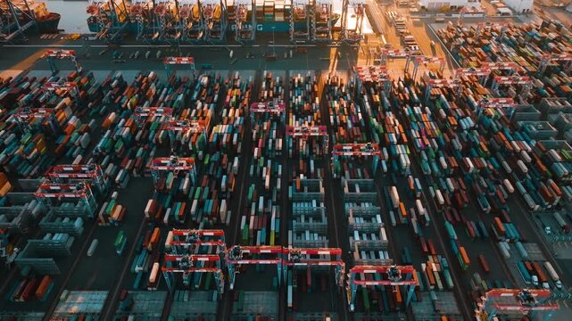 Port of Los Angeles shows container terminal operations at sunset with freight logistics and global trade activity