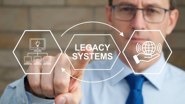 Businessman touching a virtual interface with a legacy systems concept, representing digital transformation