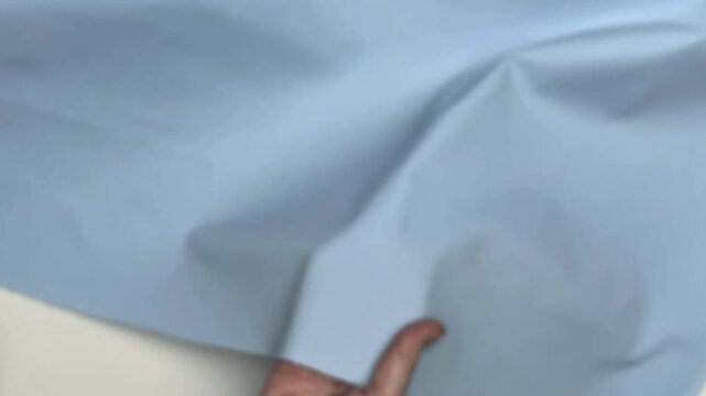 This light blue stretch cotton twill fabric offers a soft texture and durable build with a slight diagonal rib that retains its shape and provides breathable comfort for all sewing project types
