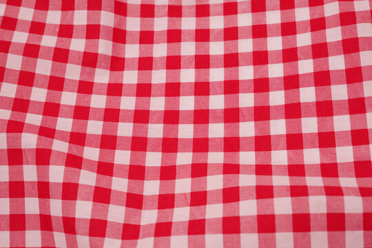 red white plaid tablecloth background. Gingham Fabric Background. 