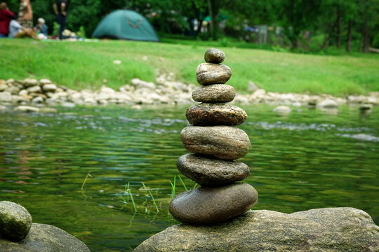 Stack of stones near riverside