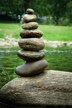 Stack of stones near riverside