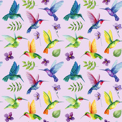 Naklejka premium hummingbird watercolor seamless pattern with tropical birds flowers leaves and colorful flying wildlife on purple background