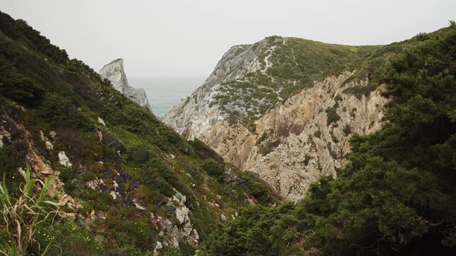 Beautiful rocks coast on the Atlantic coast. Incredible beauty rocky  of the Atlantic Ocean coast near Cape Roca. Low angle view to the beautiful rocks