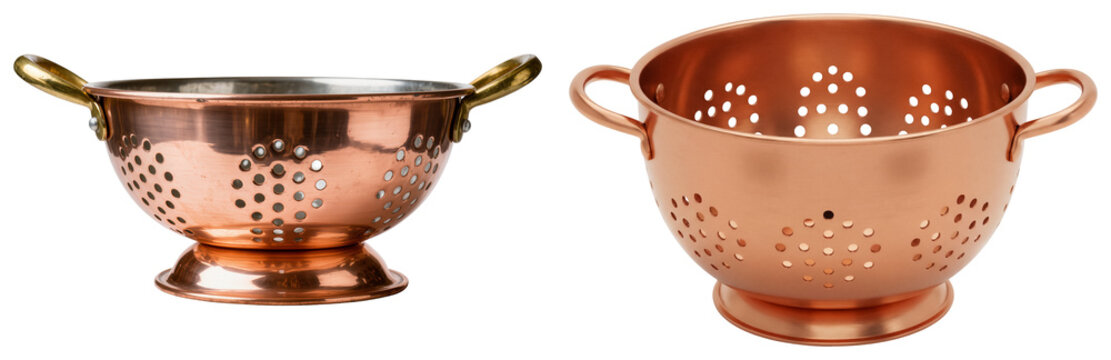 Two copper colanders with handles, isolated on a white background