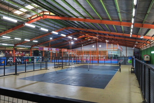 Spacious Indoor Sports Facility Features Multiple Courts For Pickleball And Padel