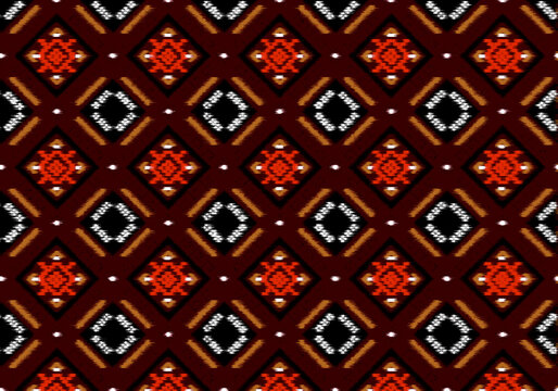 Seamless Ethnic Geometric Pattern with Red and Orange Tribal Motifs on Dark Background for Textile Design
