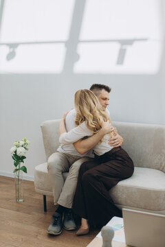 Couple embracing during therapy session offering comfort