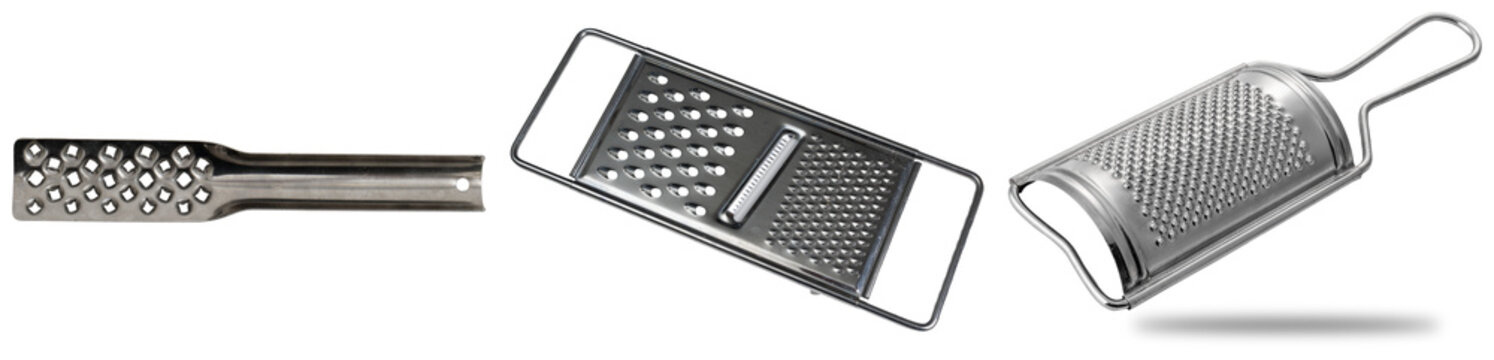 Three different types of metal graters isolated on a white background