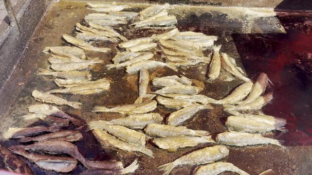 Slow Motion Close Up of Traditional Finnish Vendace Fish Frying in Butter