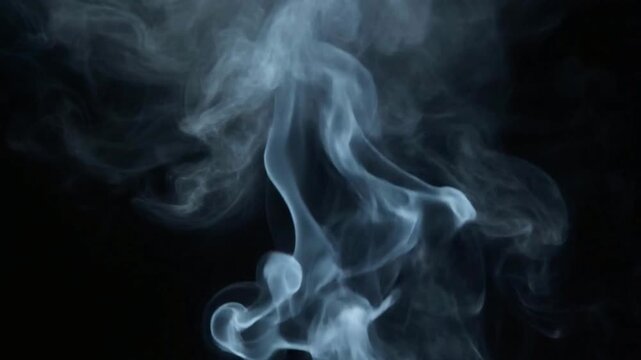 smoke arising on dark background