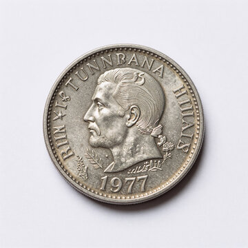 Minimalist Ancient 1977. A 1977 Thai One-Baht Coin, Showing The Front And Back, Is Isolated Against A White Background