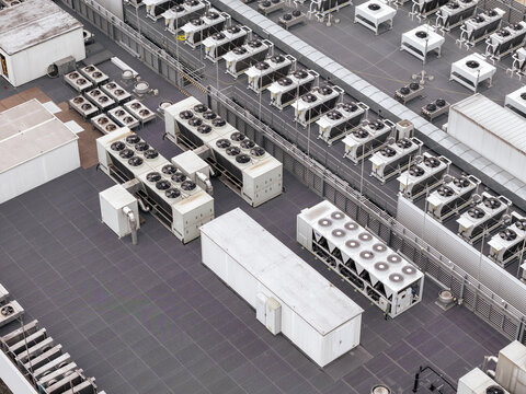 Aerial view of industrial HVAC units and cooling systems on the rooftop of the Datacenter T-Mobile in Warsaw, Masovian Voivodeship, Poland.