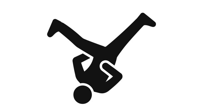 Silhouette of a breakdancer performing a freeze move.