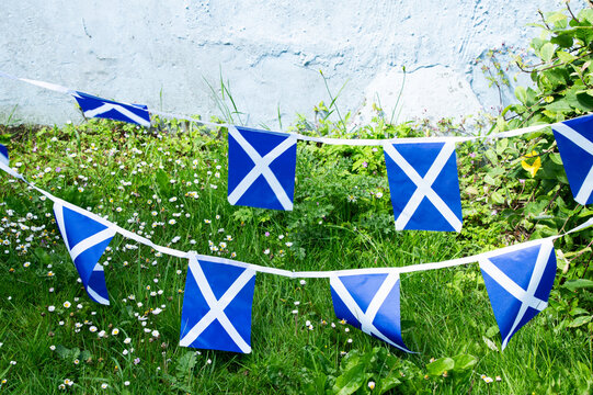 Traditional Scottish flag bunting displayed outdoors 