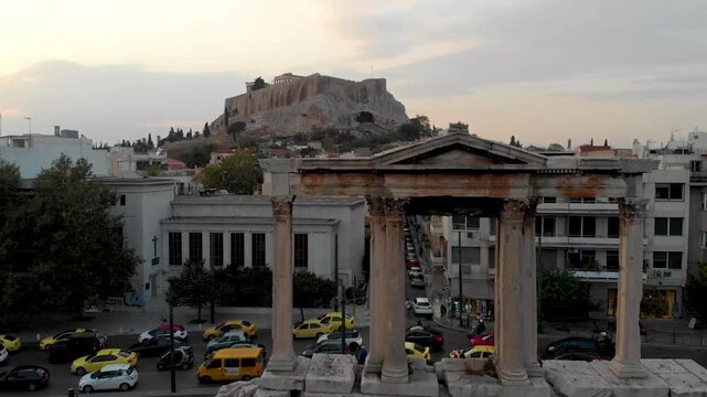 Aerial drone video of Hadrian&rsquo;s Arch in Athens, near Acropolis and Parthenon Acropolis hill, Plaka picturesque district below, Athens historic centre, Attica, Greece
