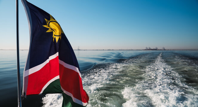 Enjoying a calm boat ride in Walvis Bay Namibia under clear blue skies