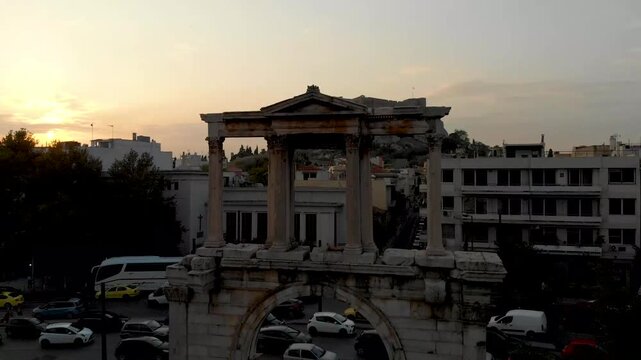 Aerial drone video of Hadrian&rsquo;s Arch in Athens, near Acropolis and Parthenon Acropolis hill, Plaka picturesque district below, Athens historic centre, Attica, Greece